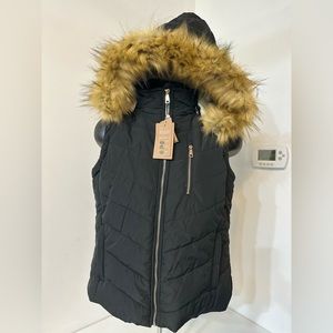 Brand new with tags, women’s puffer vest
